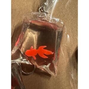 Gold fish bag dangle earrings